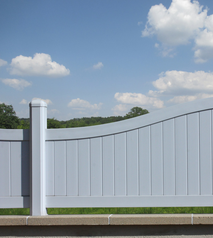 white fence and blue sky