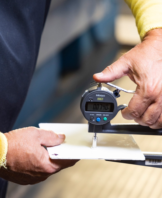 using micrometer to measure thickness