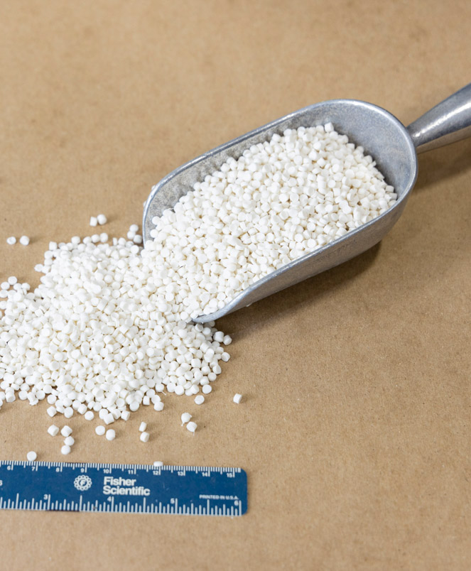 scoop of finished PVC pellets