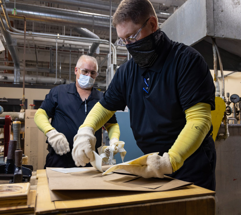 Jim and Matt removing stamps to be tested