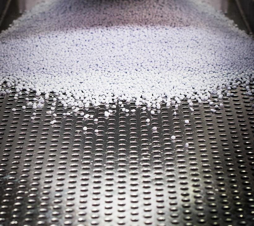 polymer pellets on production line