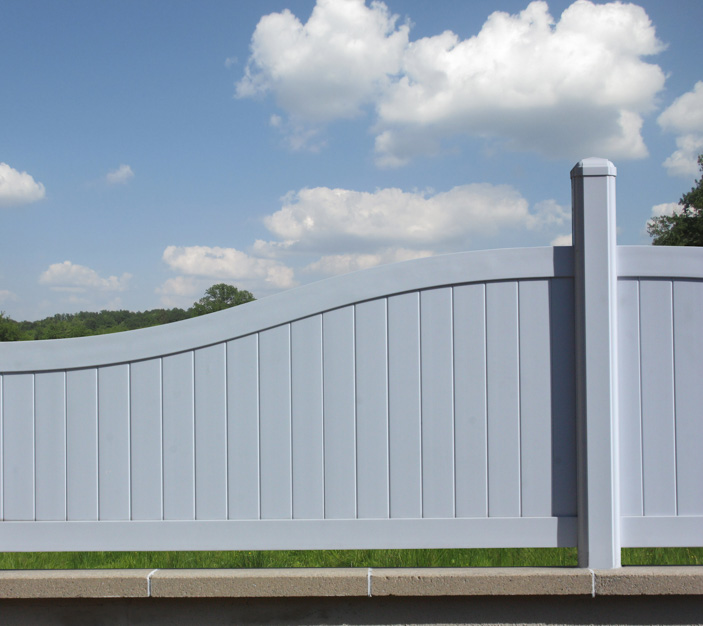 white fence with blue sky