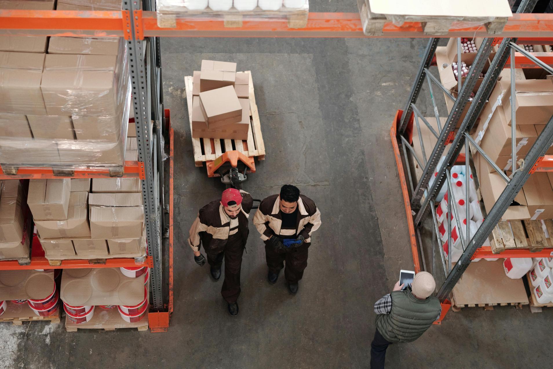 warehouse-workers-pallet-boxes-shelving-industrial-logistics